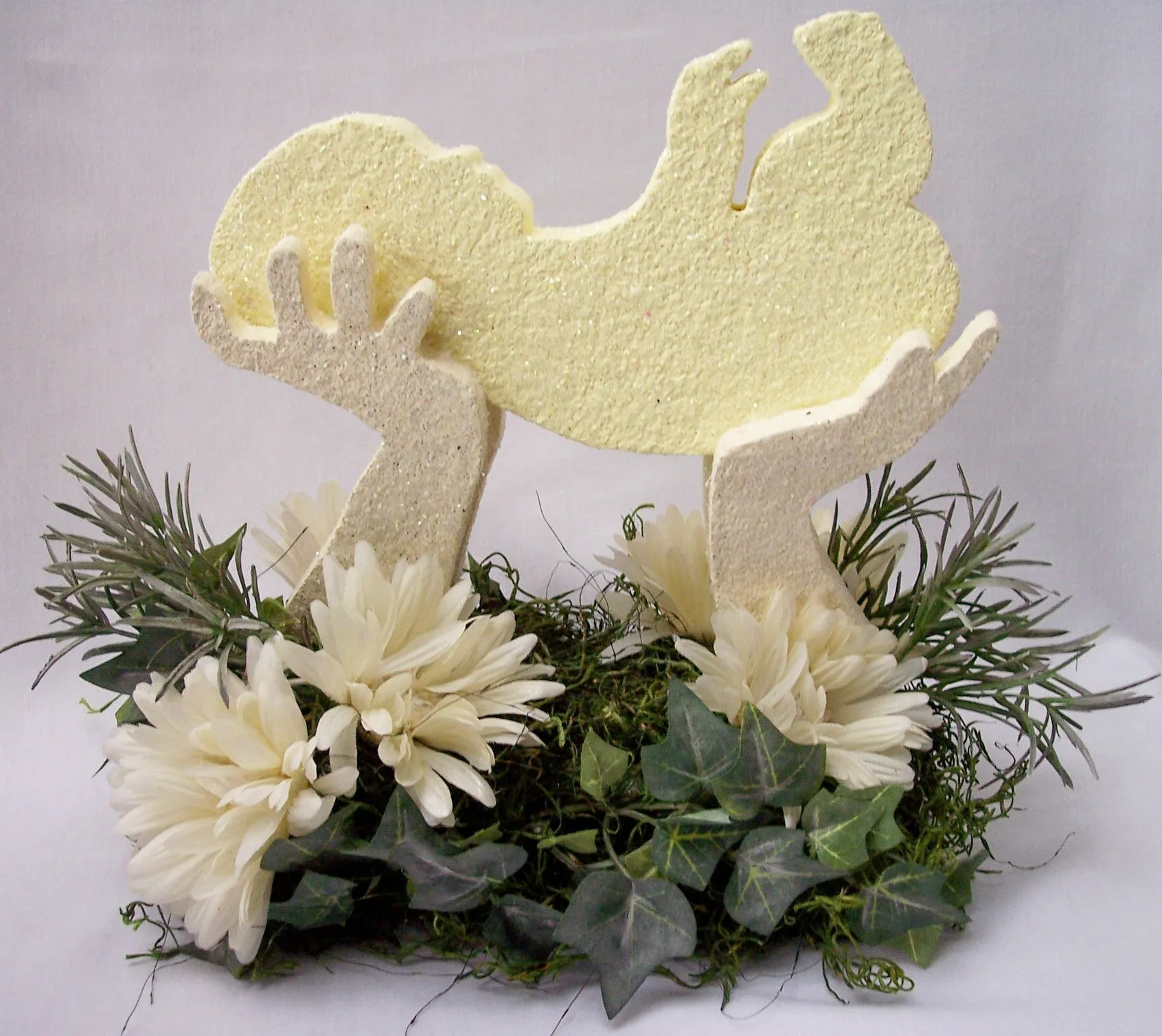 Adorable silk Baby in Hands centerpiece