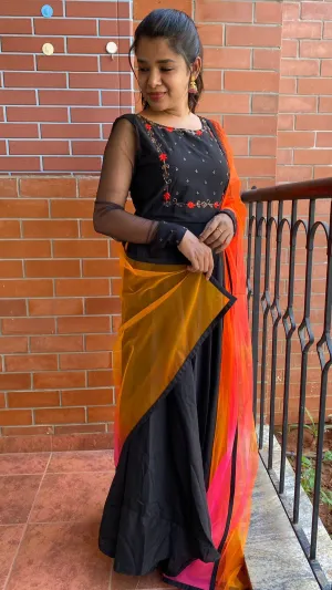 Black rose silk salwar suit of hand worked top and a red Duppata