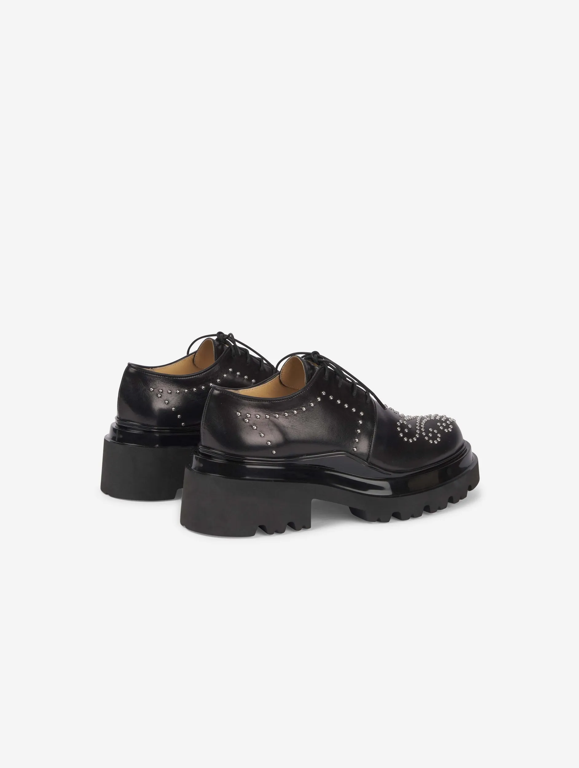 black studded leather brogues