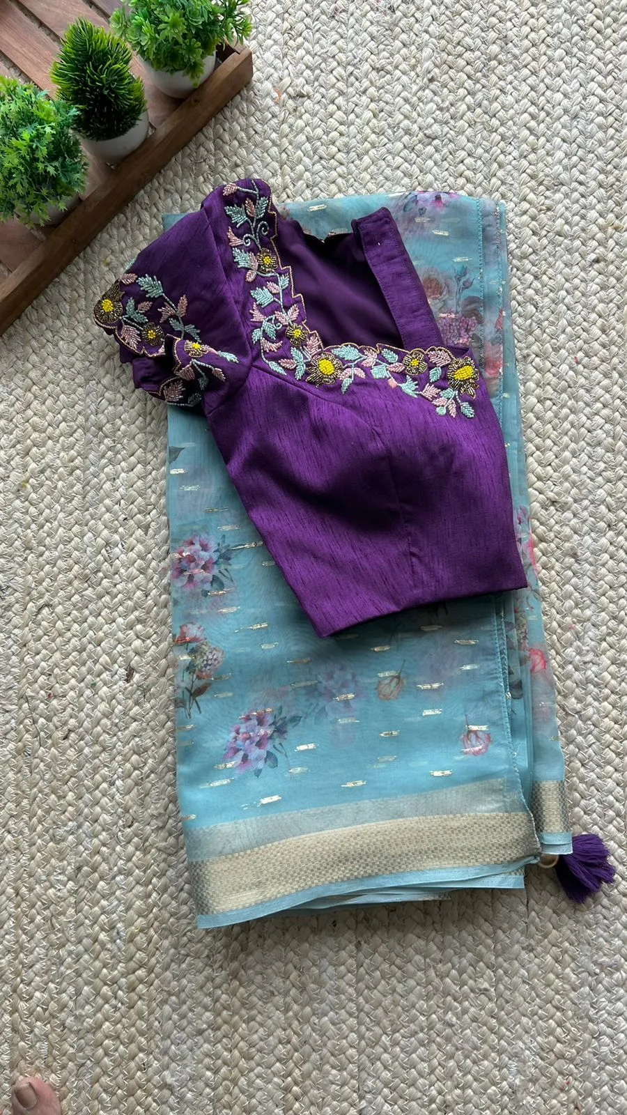 Blue organza saree with purple handwork blouse